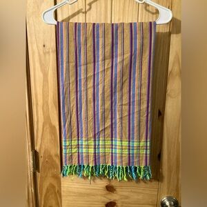 Large fringed scarf/wrap in a tan, green, and purple striped pattern